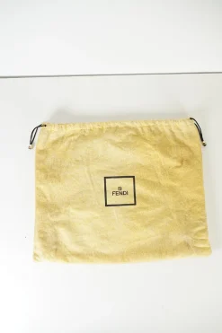 Vintage Fendi print canvas top handle bag with camel leather trimmings. Flap with turn lock fastening. Two main compartments lined in leather, one with zip pocket. Removable shoulder strap