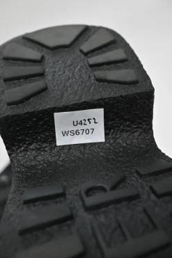 Viv' clog black patent leather ankle boot with zipper tongue and signature metal buckled side
