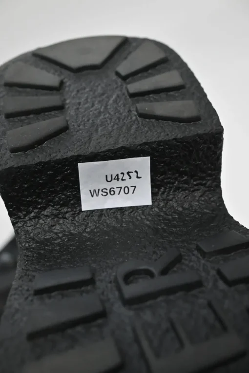 Viv' clog black patent leather ankle boot with zipper tongue and signature metal buckled side
