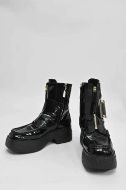 Viv' clog black patent leather ankle boot with zipper tongue and signature metal buckled side