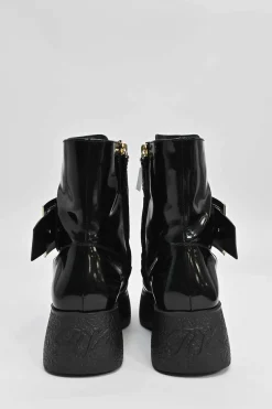Viv' clog black patent leather ankle boot with zipper tongue and signature metal buckled side