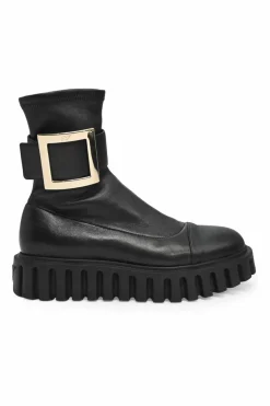 Viv' go-thick black leather platform ankle boots with oversized buckles