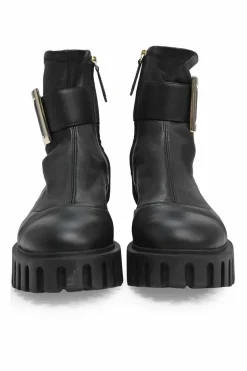 Viv' go-thick black leather platform ankle boots with oversized buckles