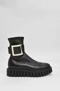 Viv' go-thick black leather platform ankle boots with oversized buckles