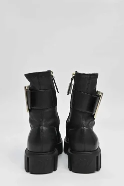 Viv' go-thick black leather platform ankle boots with oversized buckles