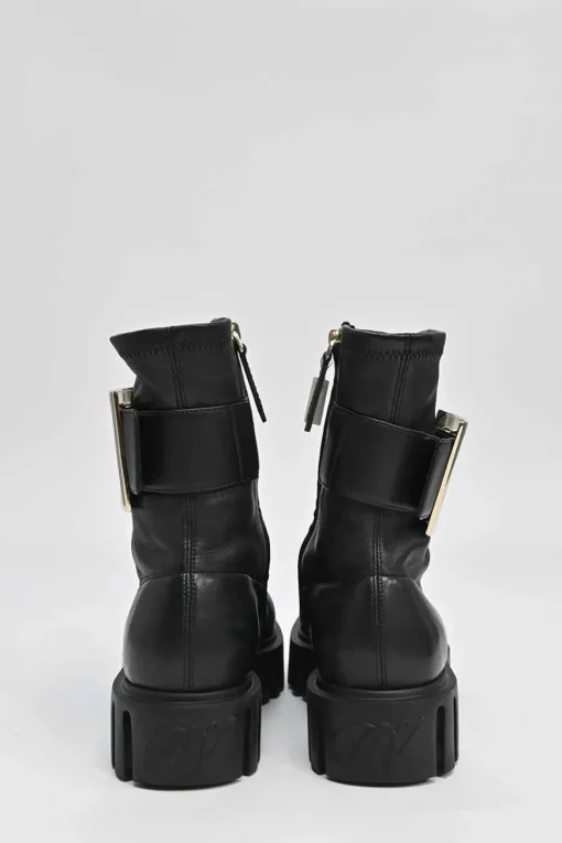 Viv' go-thick black leather platform ankle boots with oversized buckles