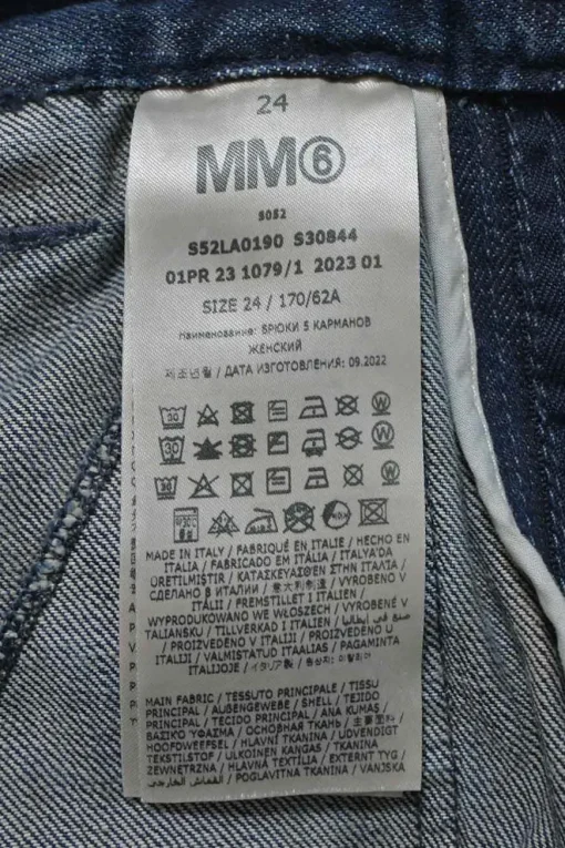 Washed dark indigo paneled cotton denim high-rise wide-leg jeans