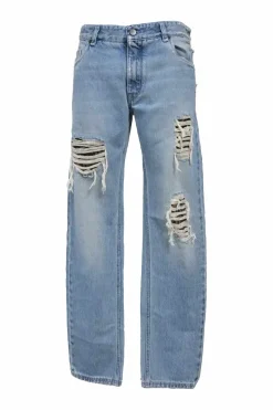 Washed indigo cotton denim distressed low-rise straight-leg jeans