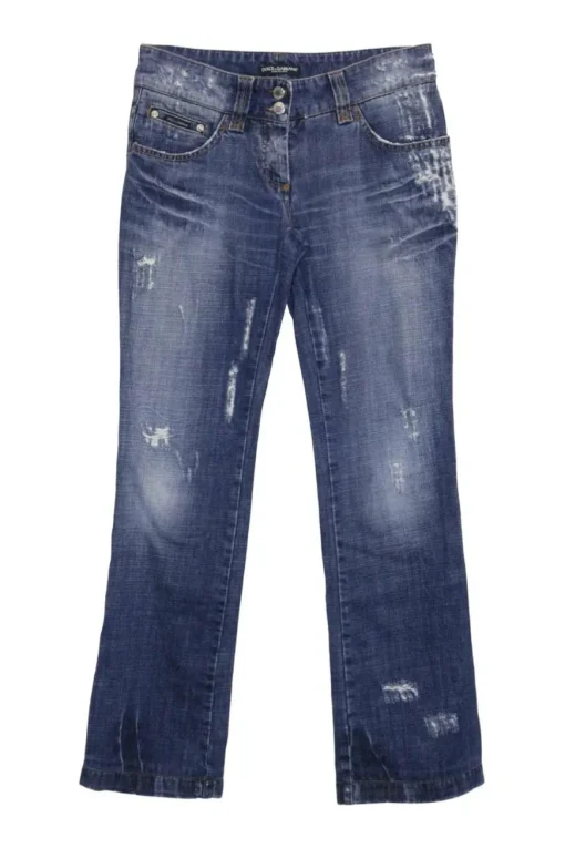 Washed indigo cotton denim low-rise bootcut jeans with whiskering details at hip level