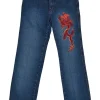 Washed indigo cotton denim denim jacket and low-rise bootcut jeans featuring dragon broderie motif