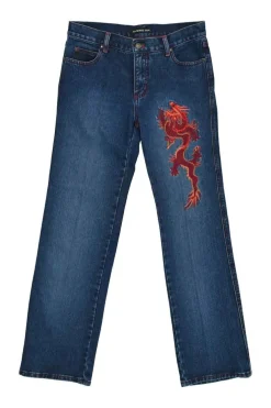 Washed indigo cotton denim denim jacket and low-rise bootcut jeans featuring dragon broderie motif