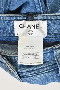 Washed indigo cotton denim pull-on low-rise skinny cropped jeans with Coco Mark shank buttons