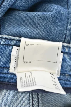Washed indigo cotton denim pull-on low-rise skinny cropped jeans with Coco Mark shank buttons