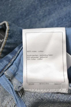 Washed indigo cotton denim high-rise straight-leg jeans featuring novelty Coco Mark belt loops
