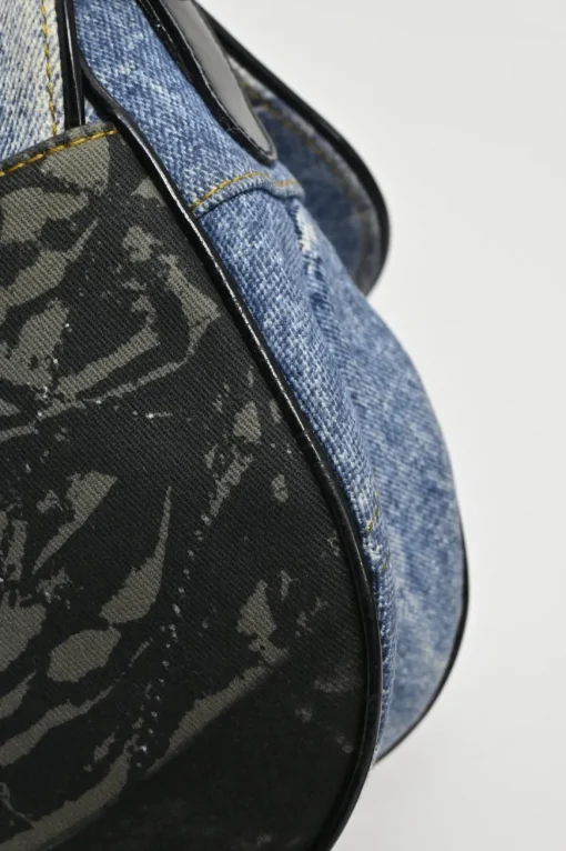 Washed indigo cotton denim-bonded leather Speedway saddle bag