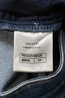 Washed indigo cotton-blend denim pull-on mid-rise cropped skinny jeans with Coco Mark shank buttons