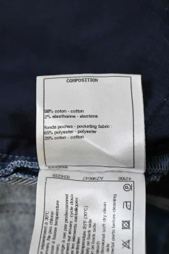 Washed indigo cotton-blend denim pull-on mid-rise cropped skinny jeans with Coco Mark shank buttons
