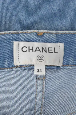 Washed indigo cotton-blend denim pull-on mid-rise cropped skinny jeans with Coco Mark shank buttons
