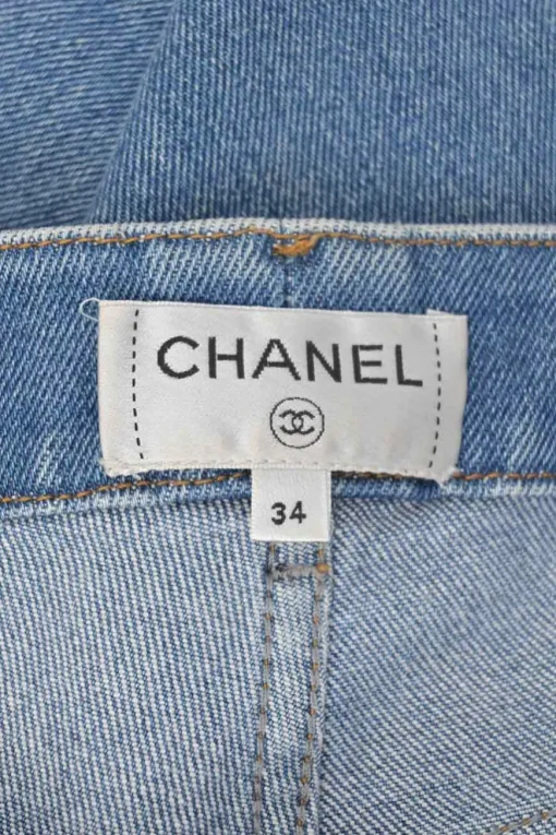 Washed indigo cotton-blend denim pull-on mid-rise cropped skinny jeans with Coco Mark shank buttons