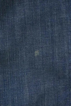 Washed indigo denim low-rise zip-ankle bow leg stove pipe jeans with rear cargo pockets