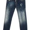 Washed indigo distressed cotton-blend denim low-rise paint splattered Pat skinny jeans with turn up cuffs