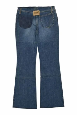 Washed indigo raw edge cotton denim pull-on low-rise flared jeans