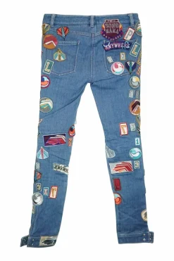 Washed patch-embellished indigo cotton-blend denim low-rise skinny cuffed jeans