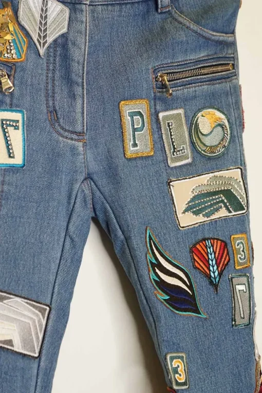 Washed patch-embellished indigo cotton-blend denim low-rise skinny cuffed jeans