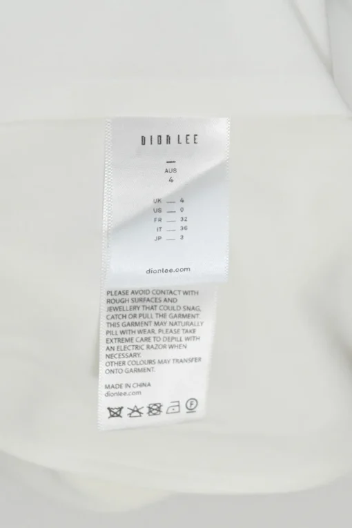 White acetate-blend bra top and  paperbag waist belted maxi skirt set