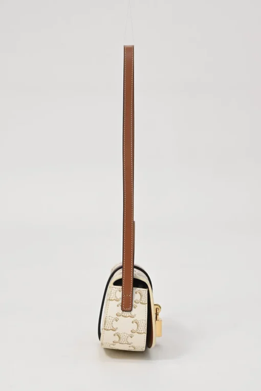 White coated Triomphe monogram canvas and calfskin Tabou clutch on strap