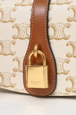 White coated Triomphe monogram canvas and calfskin Tabou clutch on strap