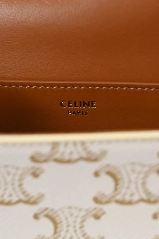 White coated Triomphe monogram canvas and calfskin Tabou clutch on strap