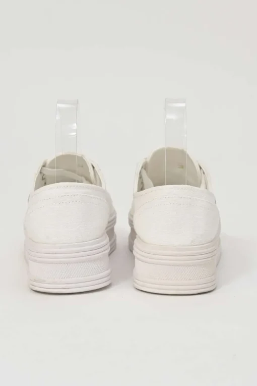 White cotton canvas Jane low-top lace-up platform sneakers featuring tonal calfskin leather Triomphe patch