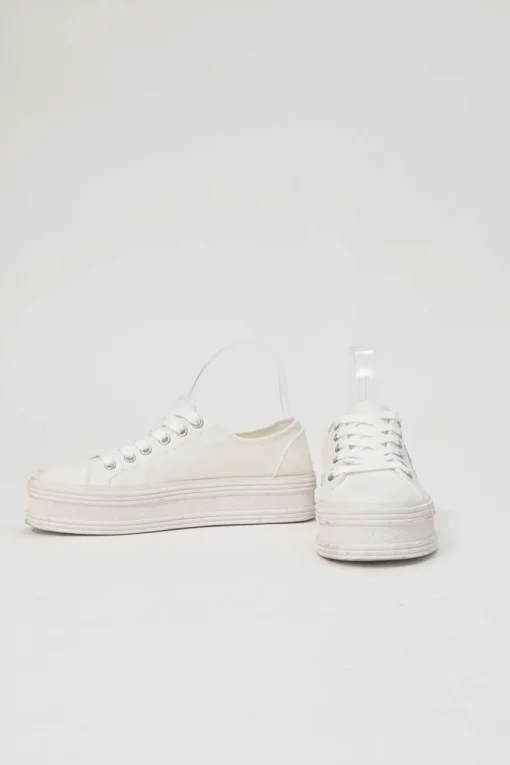 White cotton canvas Jane low-top lace-up platform sneakers featuring tonal calfskin leather Triomphe patch