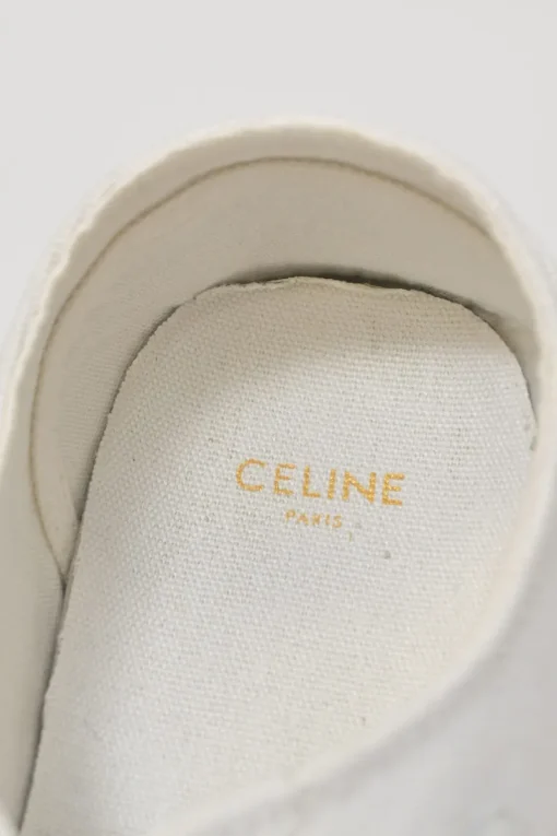 White cotton canvas Jane low-top lace-up platform sneakers featuring tonal calfskin leather Triomphe patch