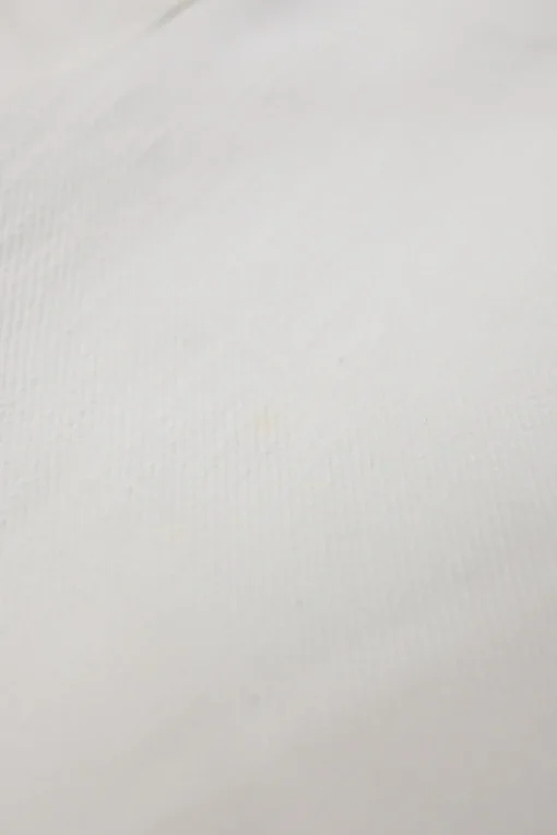White cotton low-rise wide-leg jeans with split logo waistband