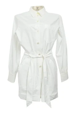 White cotton poplin point collar half-button tie-waist romper with turn-up cuffs