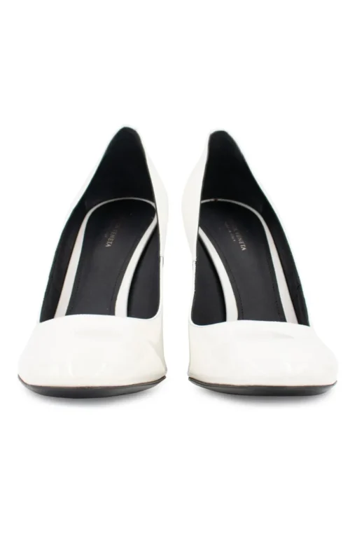 White gradient patent leather pumps with textured purple heels