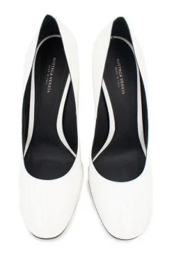 White gradient patent leather pumps with textured purple heels