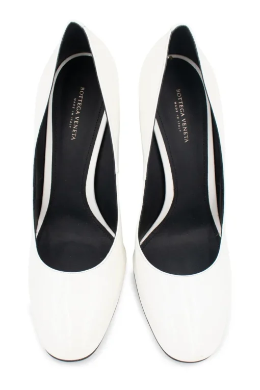 White gradient patent leather pumps with textured purple heels