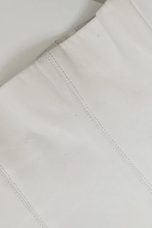 White lambskin single breasted notch lapel tailored jacket with Coco Mark shank buttons