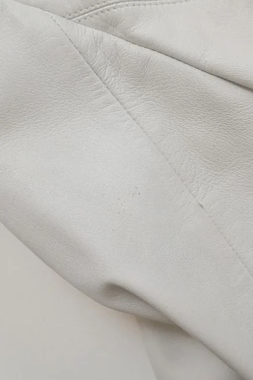 White lambskin single breasted notch lapel tailored jacket with Coco Mark shank buttons