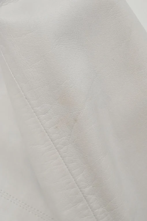 White lambskin single breasted notch lapel tailored jacket with Coco Mark shank buttons