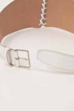White laser-cut leather corset buckle belt with lace-up detailing