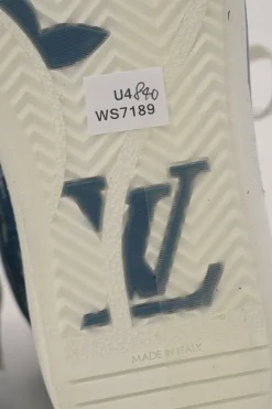 White leather and rubber high-top Charlie chunky sneakers featuring indigo monogram denim inserts