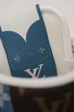 White leather and rubber high-top Charlie chunky sneakers featuring indigo monogram denim inserts