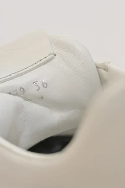 White leather and rubber tread sole flatform lace-up Derby shoes