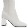 White leather square-toe zip-up ankle booties with mirrored block heel