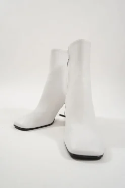 White leather square-toe zip-up ankle booties with mirrored block heel