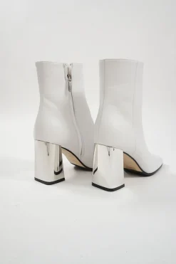 White leather square-toe zip-up ankle booties with mirrored block heel